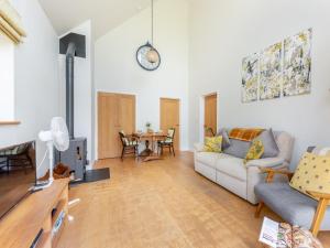 a living room with a couch and a table at 1 Bed in Etchingham oc-78940 in Hawkhurst +12 photos