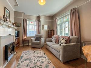 a living room with a couch and a chair at 1 Bed in Broadstairs oc-89359 in Broadstairs