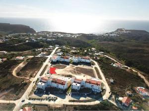 an aerial view of a resort near the ocean at Arrifana Sea Stay in Aljezur