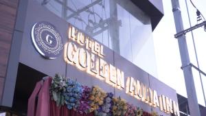 a sign that reads the los angeles coliseum at Hotel Golden Aura Inn in Gwalior