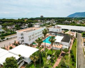 an aerial view of a city with buildings and a pool at Fiordaliso Hotel in San Felice Circeo