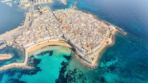 an aerial view of an island in the water at Domus Gallipoli by Casa di Marco in Gallipoli