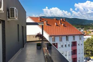 a view from the balcony of a building with a roof at Iman Apartments in Zagreb