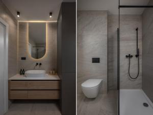 a bathroom with a shower and a toilet and a sink at Iman Apartments in Zagreb +25 photos