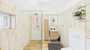 a bathroom with a shower and a sink at Dębówka in Wilcze +48 photos