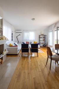 a living room with a table and a couch at Villa Branko 12km from Dubrovnik in Ravno +72 photos