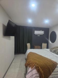 Ліжко або ліжка в номері Suite mateo