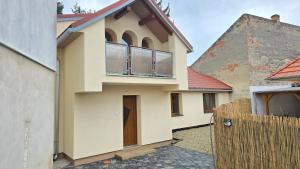 a house with a large window on the side of it at Dom Hlohovec Center in Hlohovec