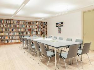 a conference room with a long table and chairs at AndersOrt Haus der Frauen in Buchberg bei Herberstein