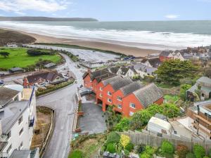 an aerial view of a coastal town with a beach at 2 Bed in Woolacombe oc-beache in Woolacombe