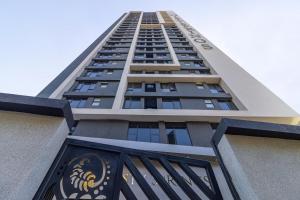 a tall apartment building with the top of it at Luxeliving Homes in Nairobi