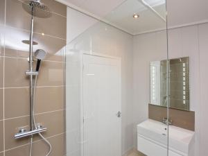 a bathroom with a shower with a glass door at 2 Bed in Anstruther oc-72435 in Anstruther +24 photos
