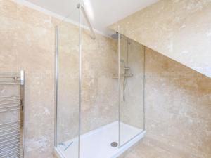 a shower with a glass door in a bathroom at 5 Bed in Wareham oc-dc032 in West Lulworth +18 photos