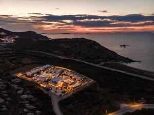 an aerial view of a cruise ship at sunset at Laguna Coast Resort, Small Luxury Hotels of the World in Stelida