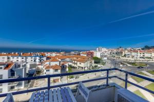 a view of a city from the balcony of a apartment at Apartamento Mar Salgado Ericeira in Ericeira