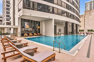 a swimming pool in the middle of a building at Miami Oasis 2BR Apt Pool & Beach Access for 5 in Miami