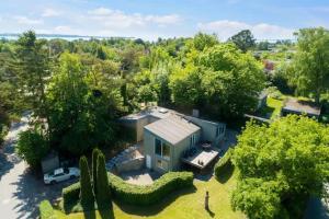 an aerial view of a house in the trees at Spacious Luxury Villa Apartment - Two Bedrooms in Egå