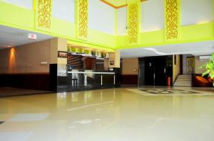 The lobby or reception area at Nirmala Hotel & Convention Centre