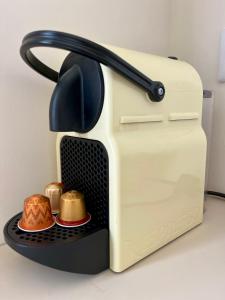 a toaster with two bowls of food in it at Palmito in Bidart
