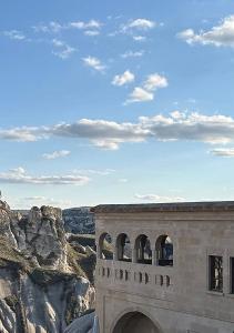 a building on the side of a mountain at Hush Cappadocia Hotel in Ürgüp