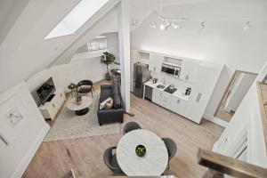 an overhead view of a living room and dining room at Placemakr Dupont Circle in Washington, D.C.