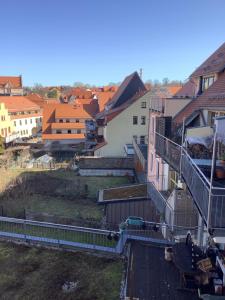 a view of the city from the roof of a building at Ferienwohnung Himmel und Hölle in Freiberg