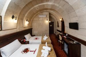 Televisyen dan/atau pusat hiburan di Burcu Kaya Hotel