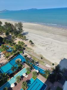 an aerial view of the beach and resort at Timurbay Seafront By Ocean waves in Kuantan