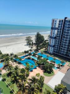 an aerial view of a resort and the beach at Timurbay Seafront By Ocean waves in Kuantan