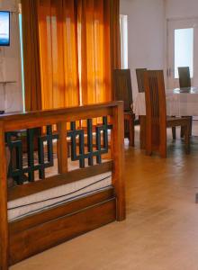 a group of chairs and a table in a room at MGM Daisy Resorts in Nuwara Eliya +19 photos