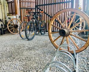 a group of bikes parked next to a fence at Apartmany a Ubytovani Mlynice Litovel in Litovel