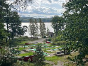 a group of boats parked next to a lake at Vuohensaari, Rantatalo 5 in Salo