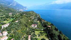 an island in the middle of a body of water at Casa Raggio di Sole in Toscolano Maderno