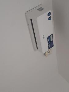 a wii controller is hanging on a wall at Pé na praia - Barraca da Márcia in Paracuru