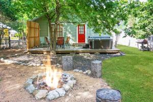 a fire pit in a yard next to a house at Bungalows on the Square- Unit 1 in Wimberley