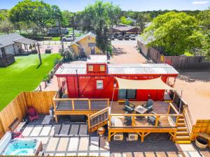 an aerial view of a house with a rv at Caboose on the Square in Wimberley