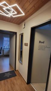a room with a door with the word lead on it at lüttje Meerzeithuus in Carolinensiel