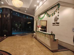 a lobby with christmas decorations on the wall at park view Service Apartment near KLCC in Kuala Lumpur +18 photos