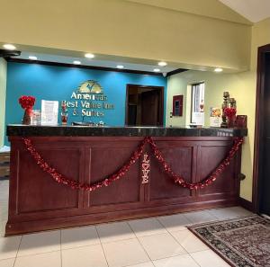 a restaurant counter with a red garland around it at Americas Best Value Inn & Suites-Alvin/Houston in Alvin +43 photos