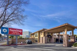 a sign in front of a hotel at SureStay Plus Hotel by Best Western Mountain View in Mountain View