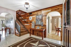 a home office with a wooden wall at Lakeside Overlook in Canyon Lake