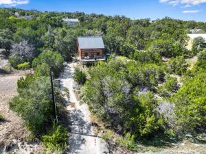 an aerial view of a cabin in the woods at Ozuye Lodge in Fischer