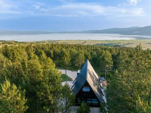 an overhead view of a building in the trees at Continental Adventure Resort - Mountain Escape & Glamping in Livno +50 photos