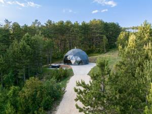 an overhead view of a tent in a forest at Continental Adventure Resort - Mountain Escape & Glamping in Livno