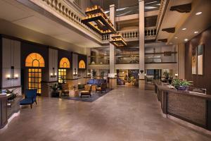 a lobby of a hotel with couches and chairs at Hilton Phoenix Tapatio Cliffs Resort in Phoenix