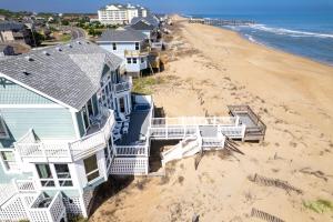 an aerial view of a house on the beach at 4000 - Fragile Magic in Kitty Hawk +53 photos