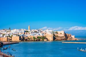 a view of a city from the water at Tabriquet urban shared room in Salé