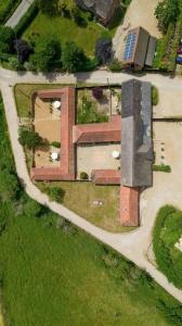 an aerial view of a building in a field at Avocet Cottage in Dunwich