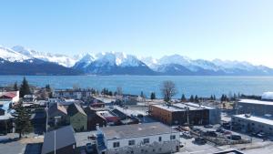 an aerial view of a town next to a body of water at Hotel North in Seward