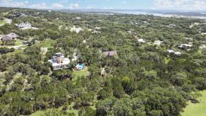 an aerial view of a house in the trees at Canyon Lake Lighthouse in Canyon Lake